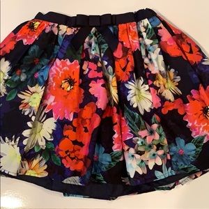 Floral skirt with bow and underskirt. Sz 9-10 yrs